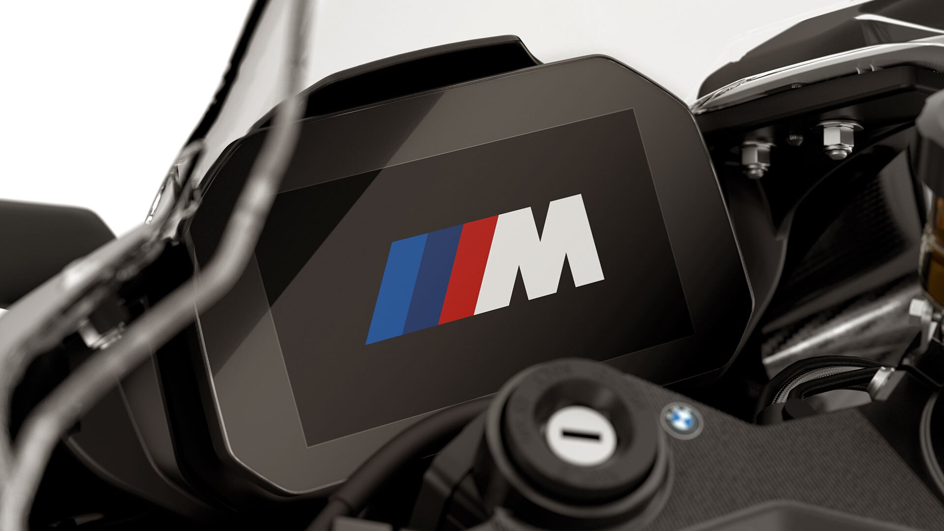 Vediamo l'animazione di avvio con il logo M nel cockpit della M RR.